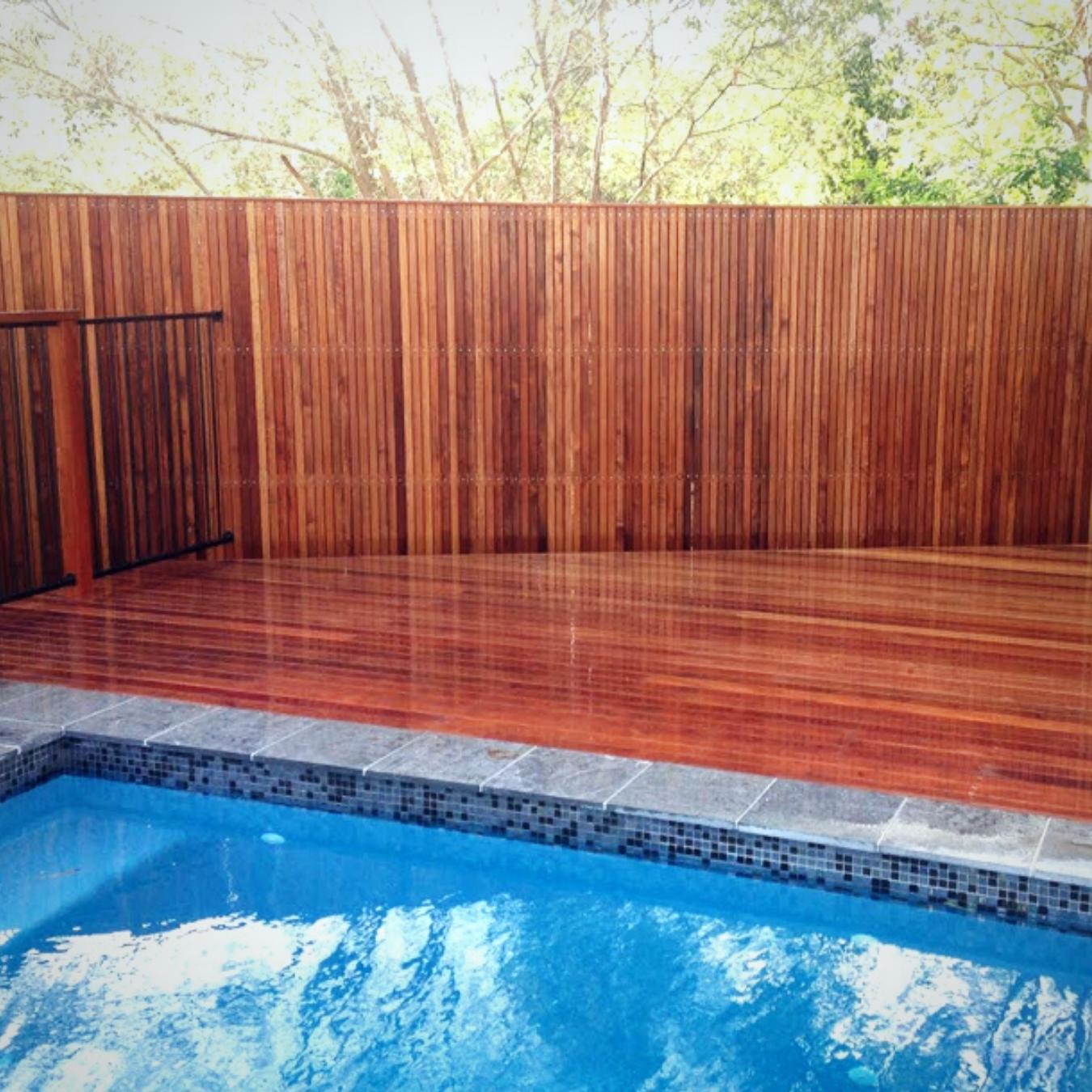 How can I maintain my wooden deck to ensure longevity?